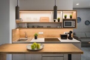 Superior Apartment with Garden View (Apt.4) | Private kitchen | Fridge, microwave, dishwasher, espresso maker