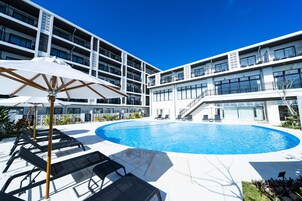 Outdoor pool, open 10:00 AM to 7:00 PM, pool umbrellas, sun loungers