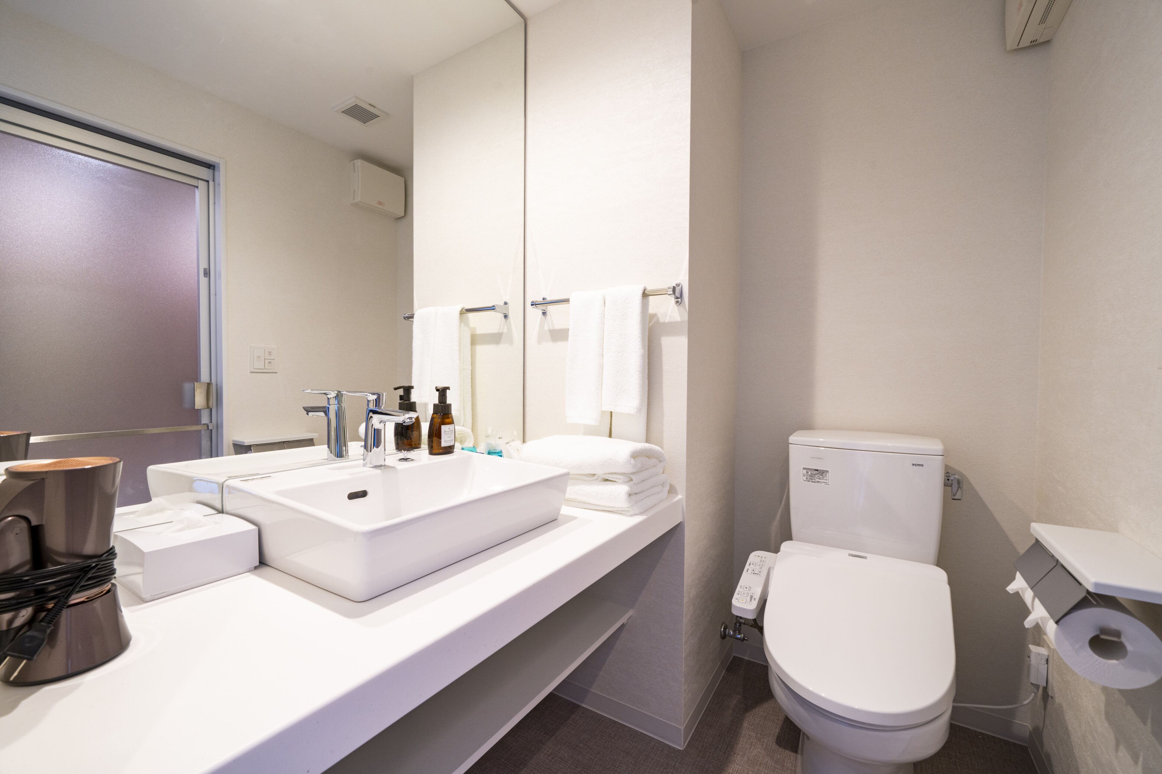 free toiletries, hair dryer, slippers, electronic bidet