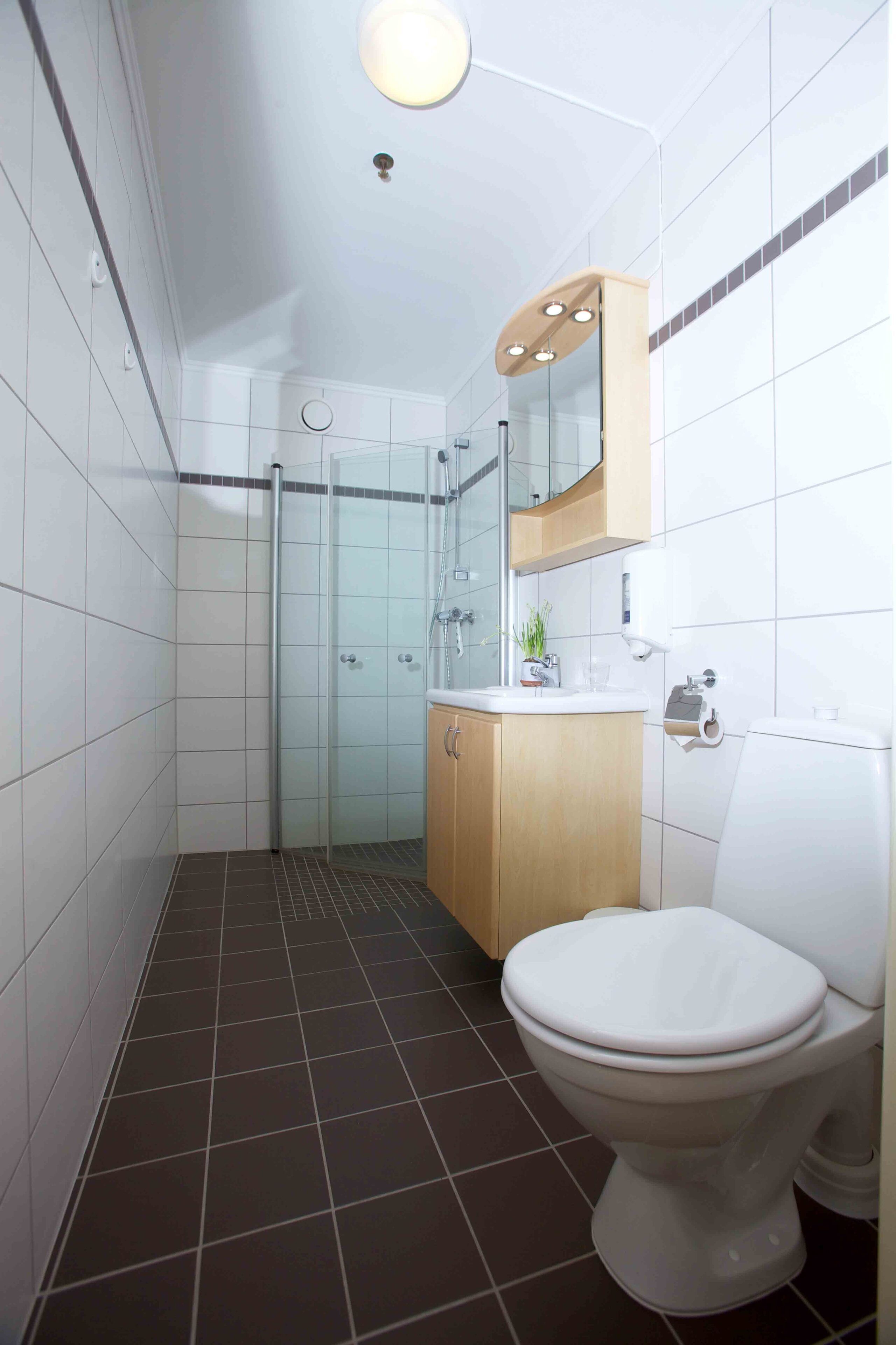 basic double or twin room | bathroom shower