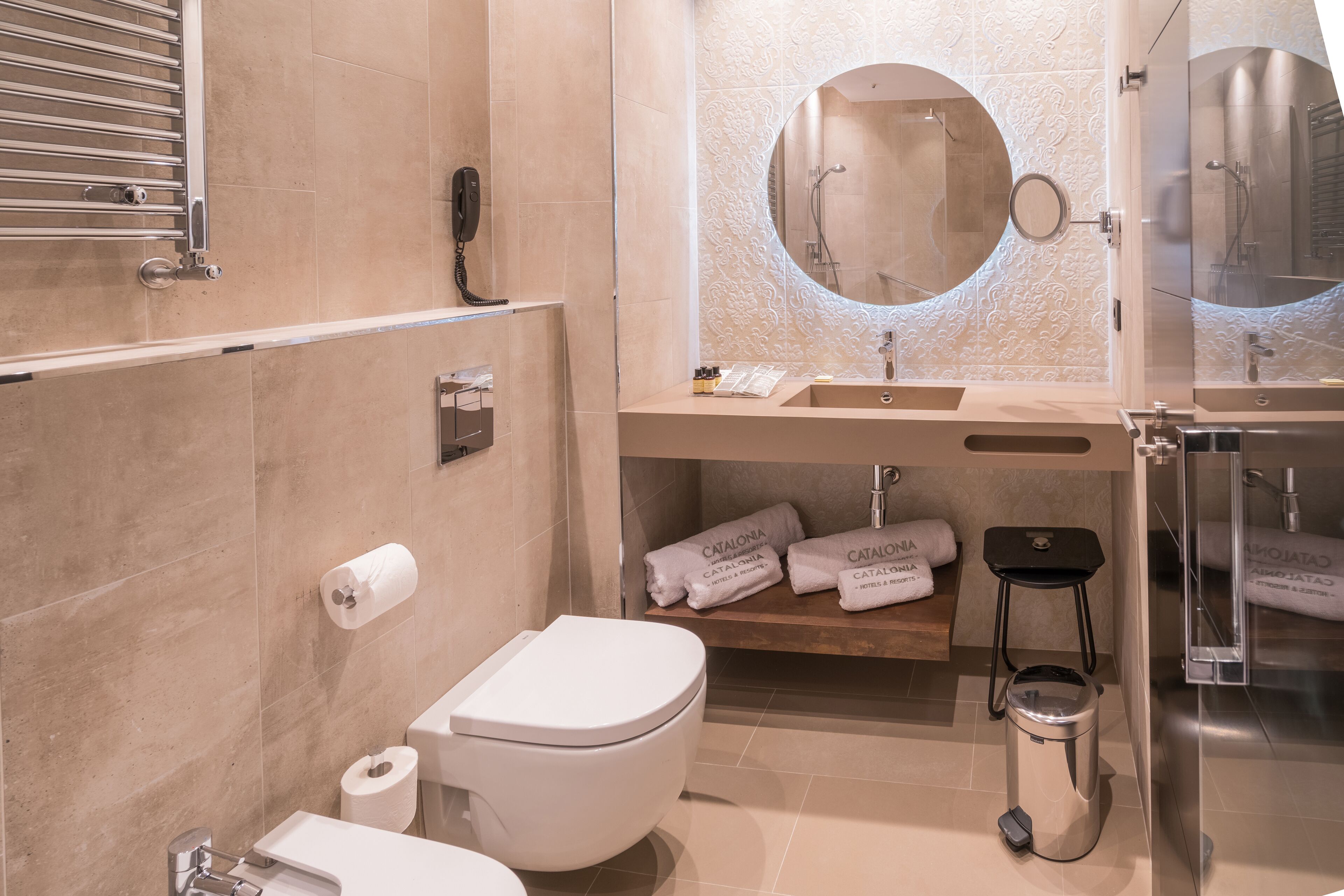 eco-friendly toiletries, hair dryer, towels