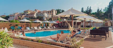 Seasonal outdoor pool, pool umbrellas, pool loungers