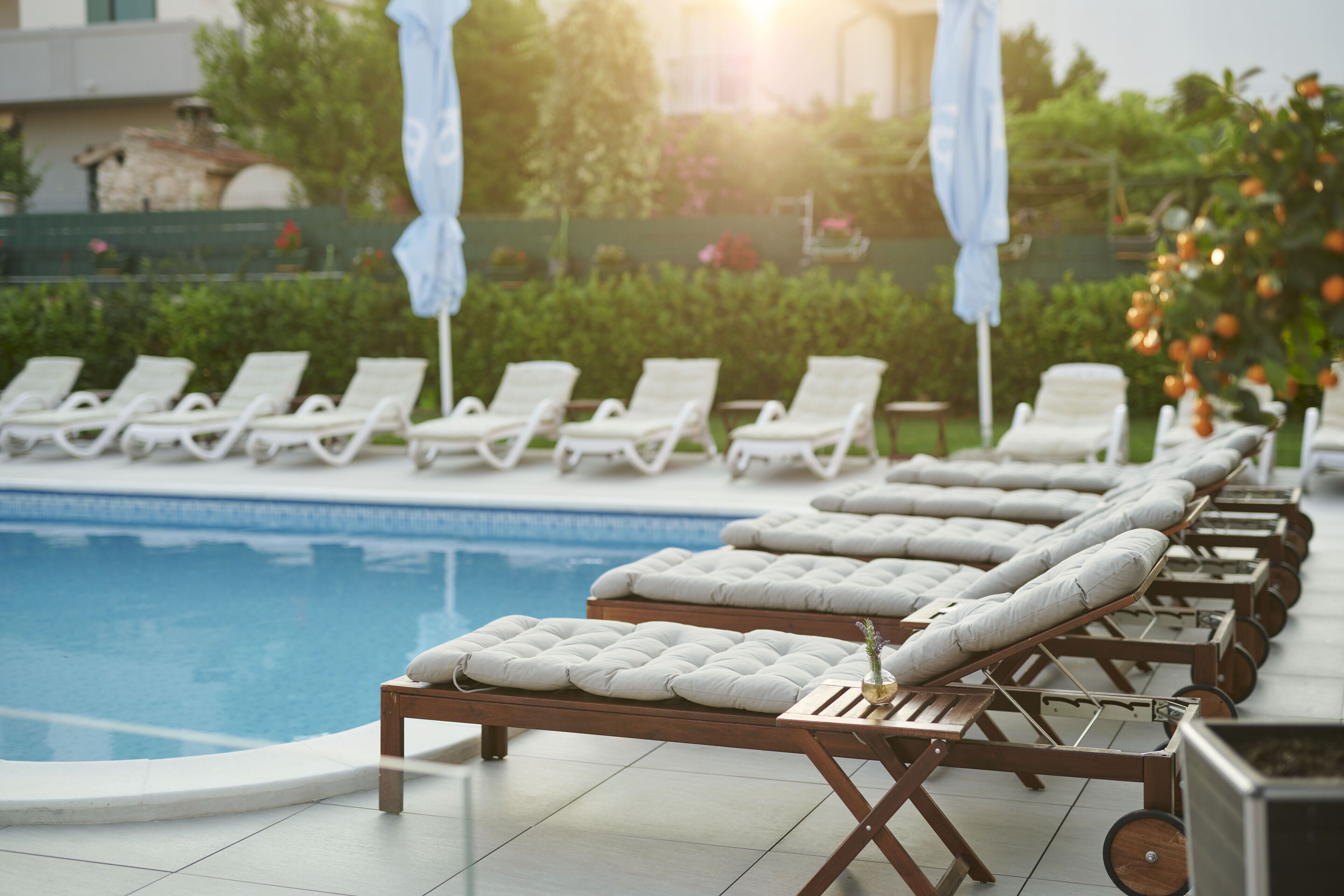 Seasonal outdoor pool, pool umbrellas, sun loungers