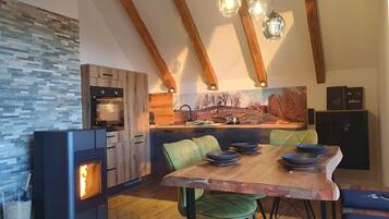 Premium Condo, 2 Bedrooms | Living area | Flat-screen TV, table tennis, heated floors