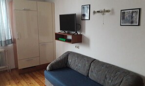 Apartamento (B) | Zona de estar | Una televisión de pantalla plana