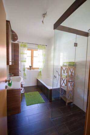 Separate tub and shower, hair dryer, towels