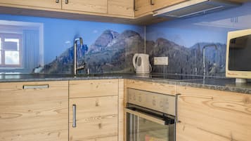 Apartment (Spielberg) | Eigene Küche | Kühlschrank, Mikrowelle, Herdplatte, Geschirrspüler