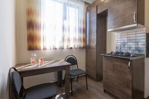 Panoramic Apartment, Balcony, City View | Private kitchenette | Full-size fridge, microwave, stovetop, electric kettle - Umba Apartment N3 (Yerevan)