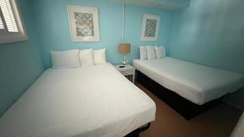 Down comforters, pillowtop beds, laptop workspace, blackout drapes