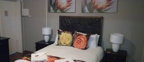 Habitación Deluxe (2) | Decoración personalizada y insonorización