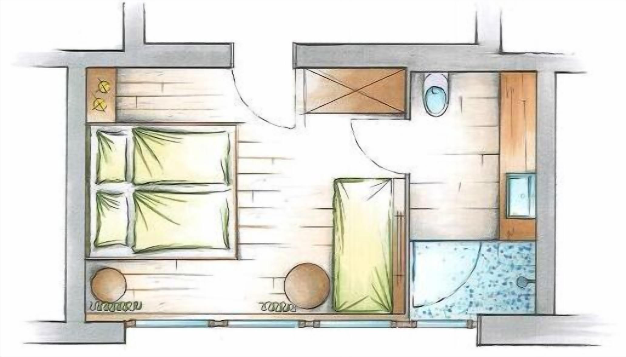 Distribución de una habitación de hotel con cama, baño y una pequeña zona de estar.