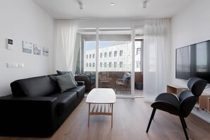 TV - SIF Apartments - 2 bedrooms with 2 bathrooms (Reykjavík)