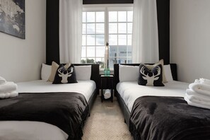 3 slaapkamers, een bureau, een strijkplank/strijkijzer, wifi