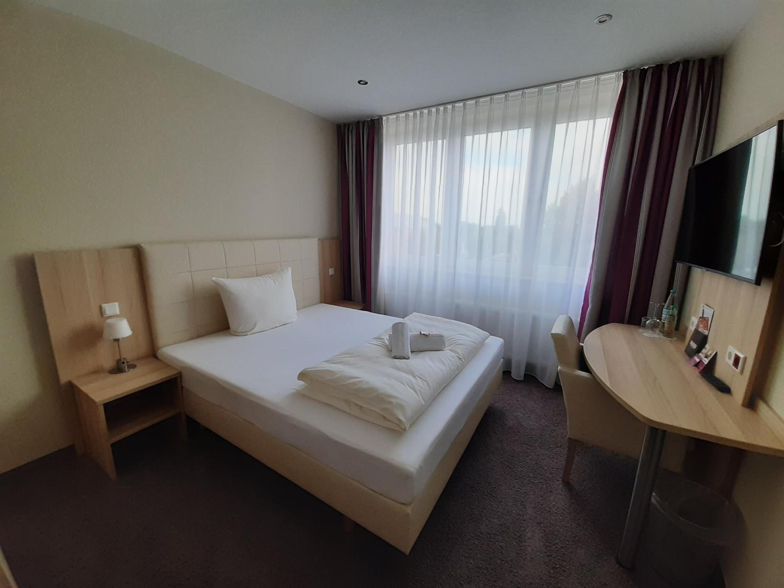 1 bedroom, desk, laptop workspace, blackout curtains