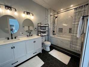 Bathtub, hair dryer, towels