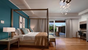 A modern bedroom with a four-poster bed, a bedside table with a lamp, and a view of the outdoor patio. - Restia (Corfu)