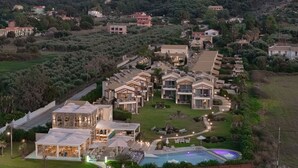 A resort with multiple villas, a swimming pool, and a restaurant. - Restia (Corfu)