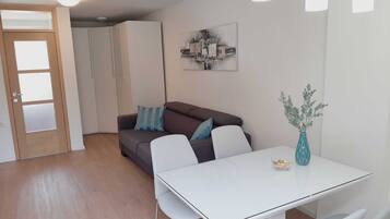Apartment (One Bedroom Apartment) | Living area | TV