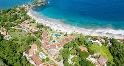 Luxury Beachfront Condo w/ High-End Wood Furnishings and Ocean Views in Exclusiv