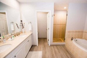 Separate tub and shower, hair dryer, towels