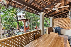 Outdoor dining - Colorful & Private 2-Bedroom Condo Just a Short Walk from the Beach (Coco)