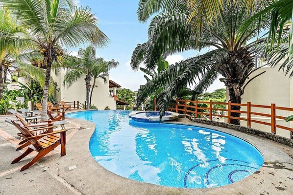 Pool - Colorful & Private 2-Bedroom Condo Just a Short Walk from the Beach (Coco)