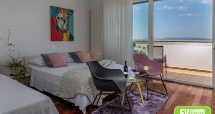 Terra Magica Deluxe Apartment OR Room with Private Parking, Terrace and Sea View