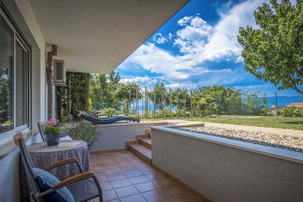 Deluxe Apartment, 1 King Bed with Sofa bed, Terrace, Sea View | Terrace/patio