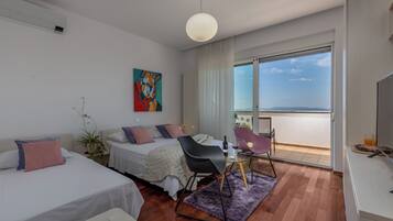 Panoramic Triple Room, 1 Bedroom, Balcony, Sea View | Premium bedding, memory-foam beds, minibar, individually decorated
