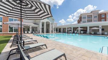Seasonal outdoor pool, open 9:00 AM to 6:00 PM, free pool cabanas