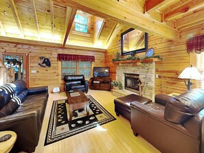 Studio (3 Bedrooms) | Living area | TV, fireplace