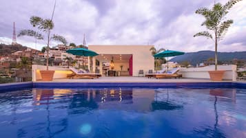 Outdoor pool, open 8:30 AM to 8:30 PM, pool loungers