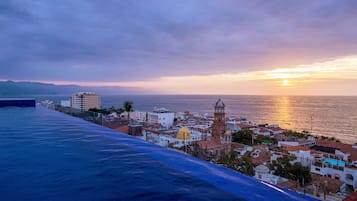 Outdoor pool, open 8:30 AM to 8:30 PM, pool loungers