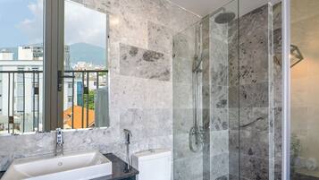 Shower, rainfall showerhead, towels