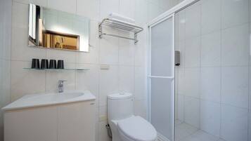 Shower, free toiletries, hair dryer, slippers