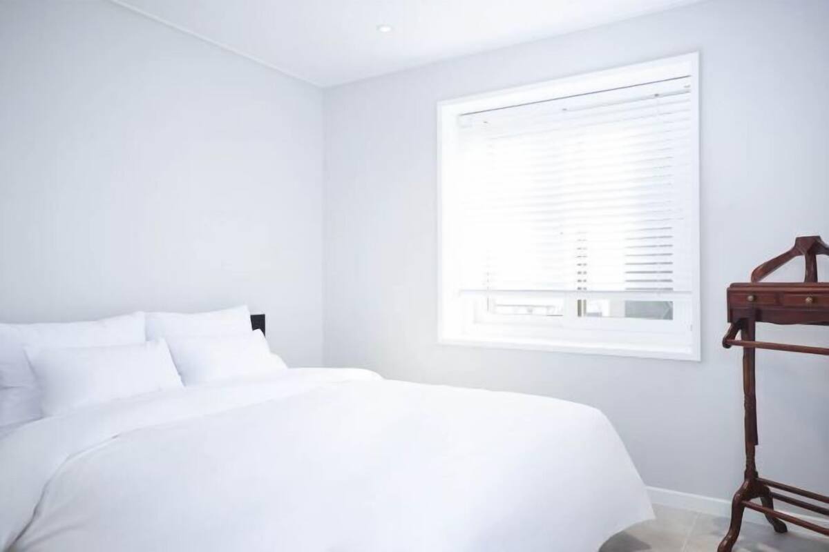 Premium bedding, blackout drapes, soundproofing, WiFi (free)