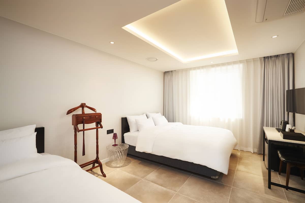 twin room (1 double bed, 1 single bed) | 1 bedroom, premium bedding, blackout curtains, soundproofing