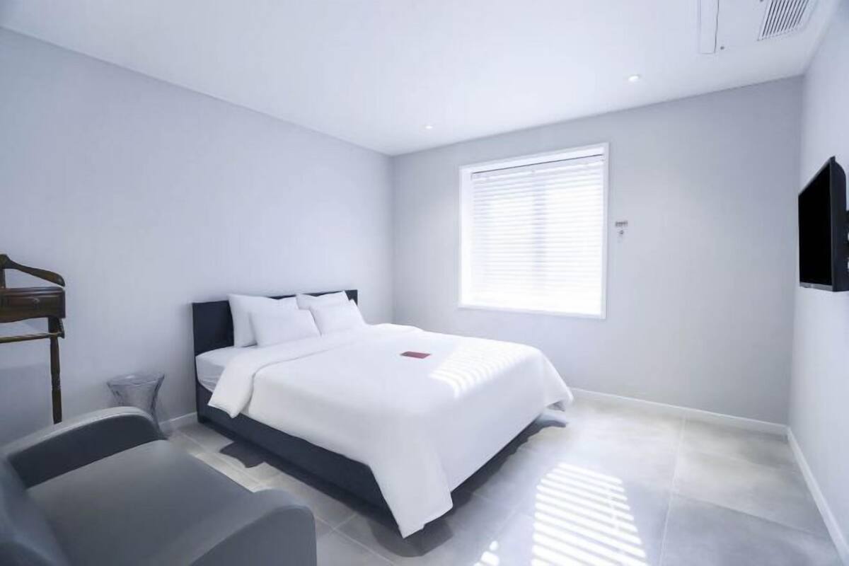 Premium bedding, blackout drapes, soundproofing, WiFi (free)