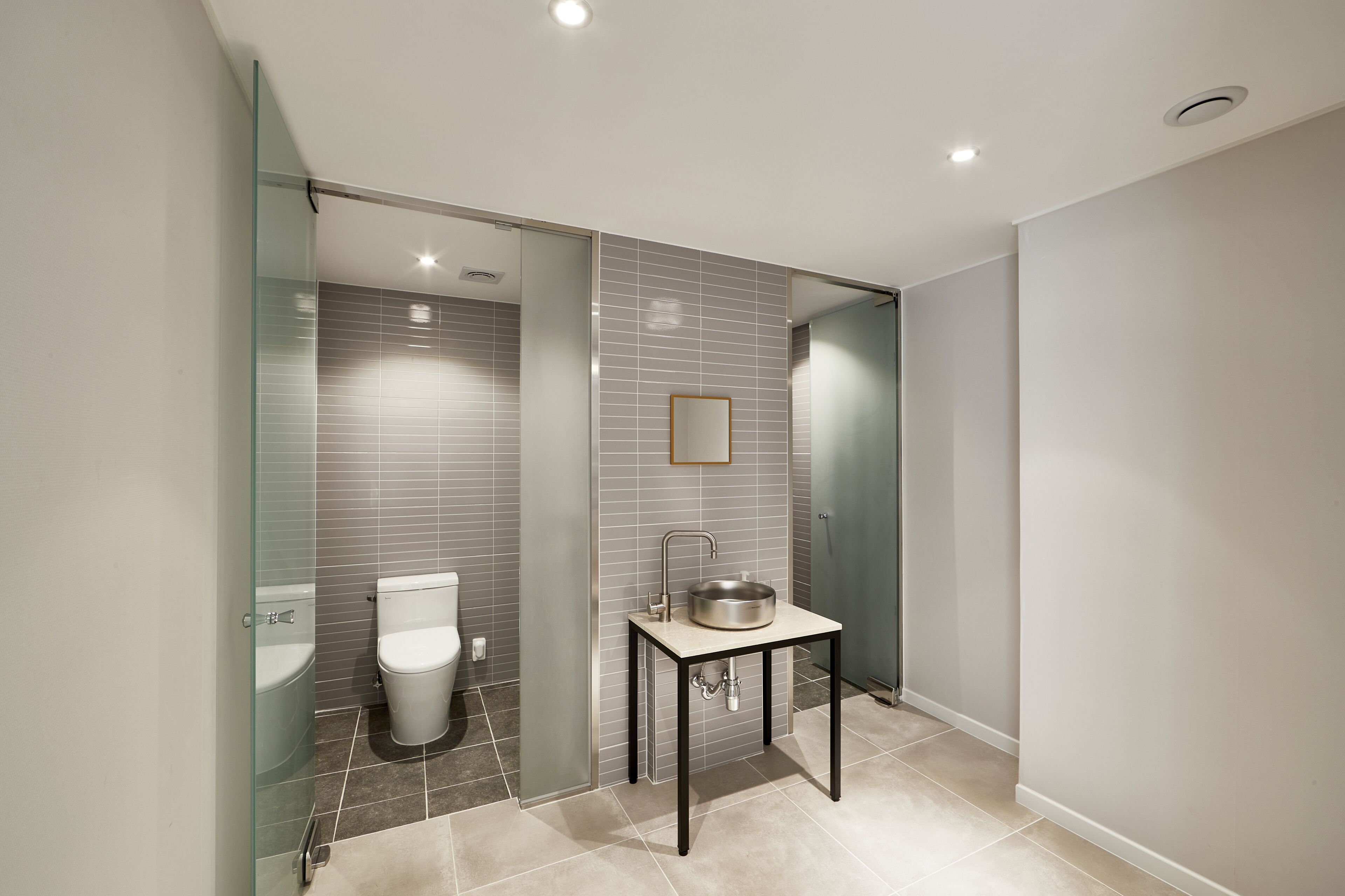 twin room (1 double bed, 1 single bed) | bathroom | designer toiletries, hair dryer, bathrobes, slippers