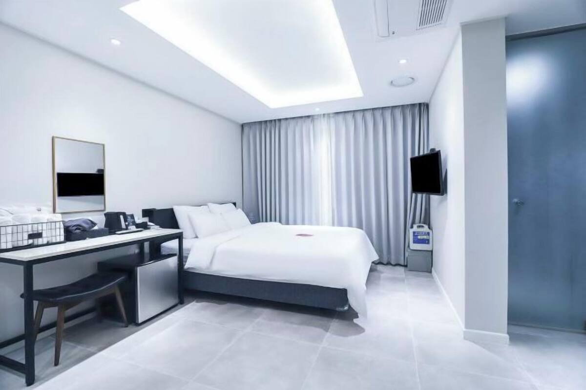 Premium bedding, blackout drapes, soundproofing, WiFi (free)