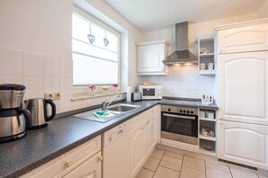 Refrigerador, microondas, horno y lavavajillas 