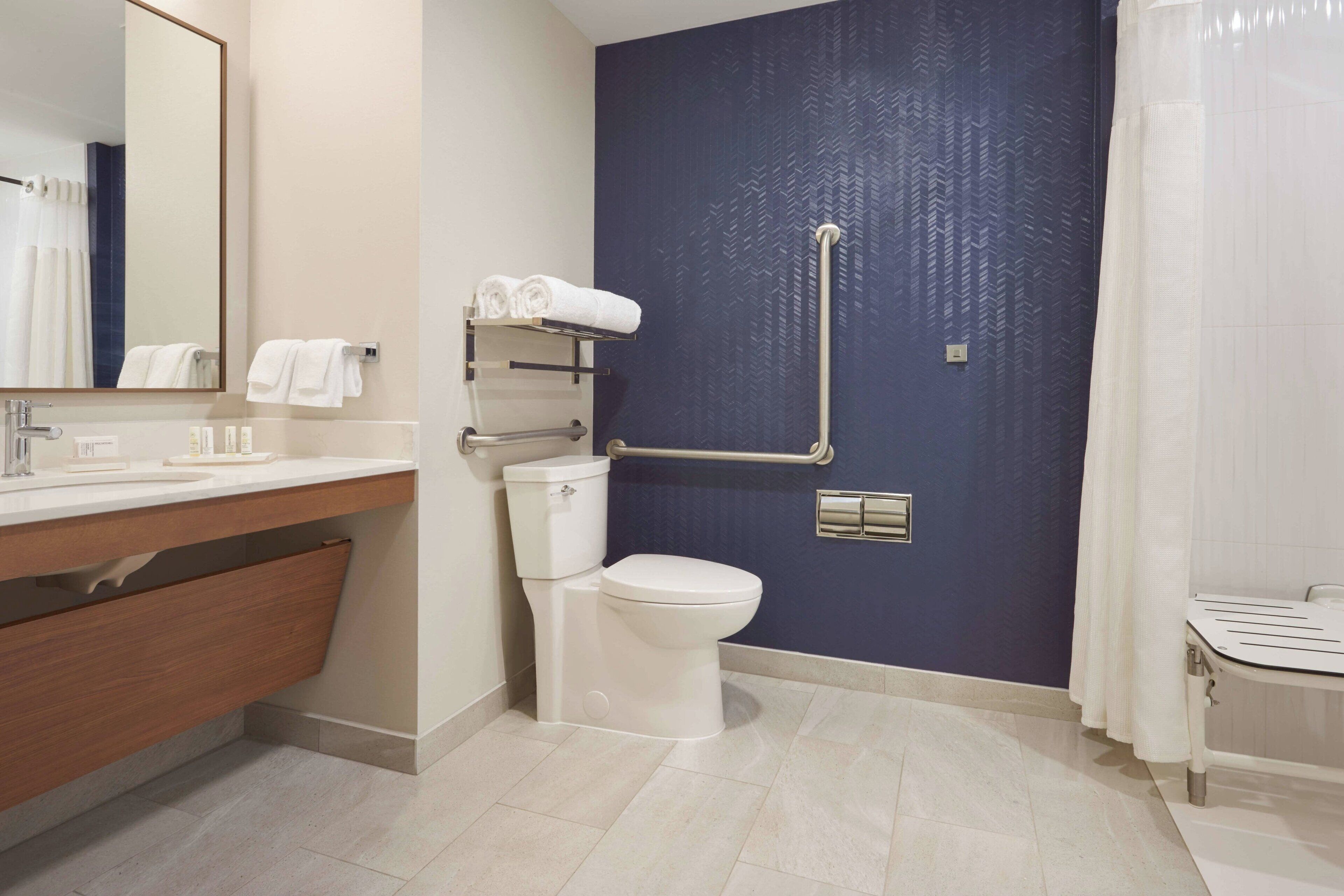 hair dryer, towels, soap, shampoo