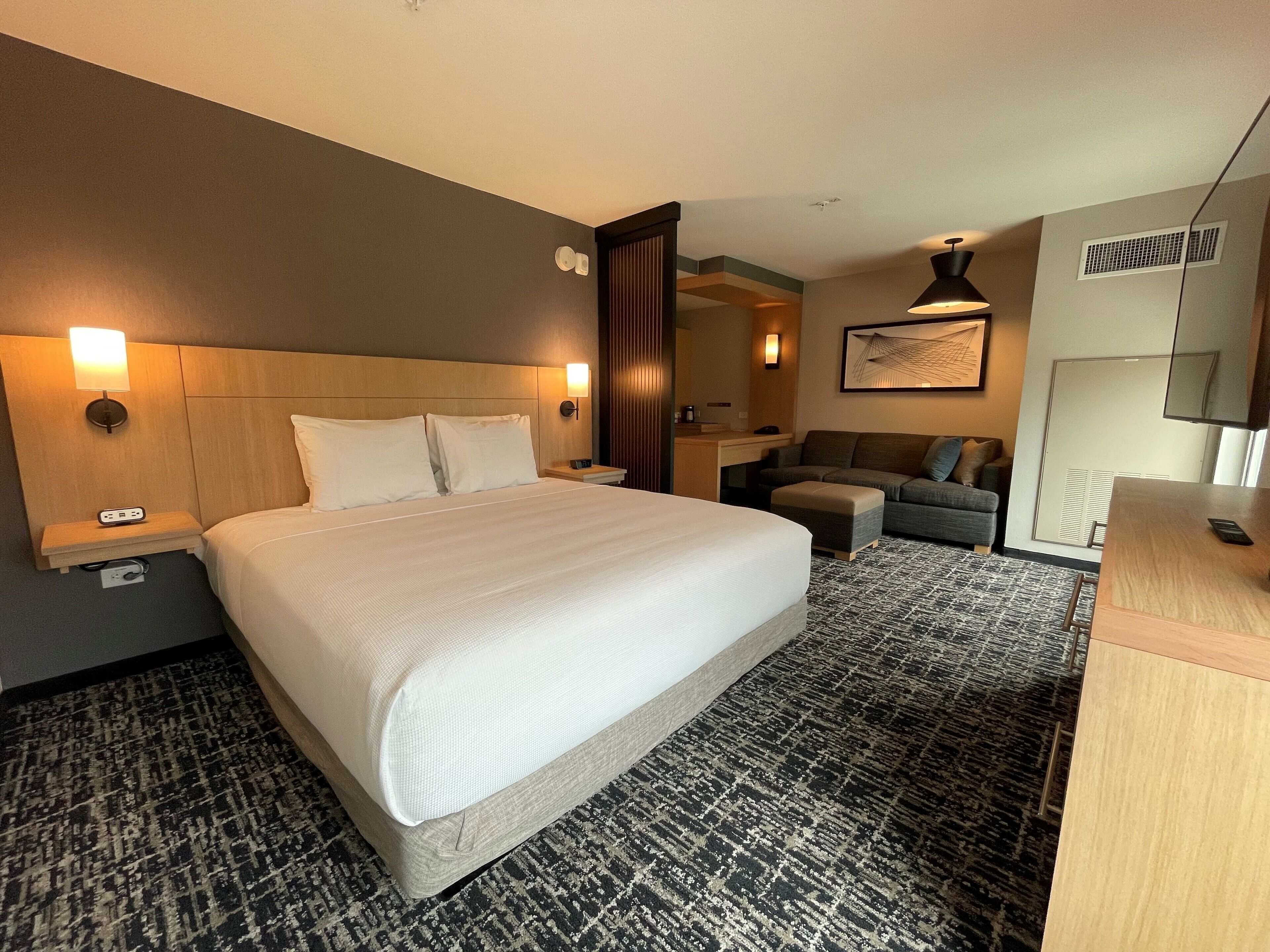 down duvets, pillow-top beds, in-room safe, desk