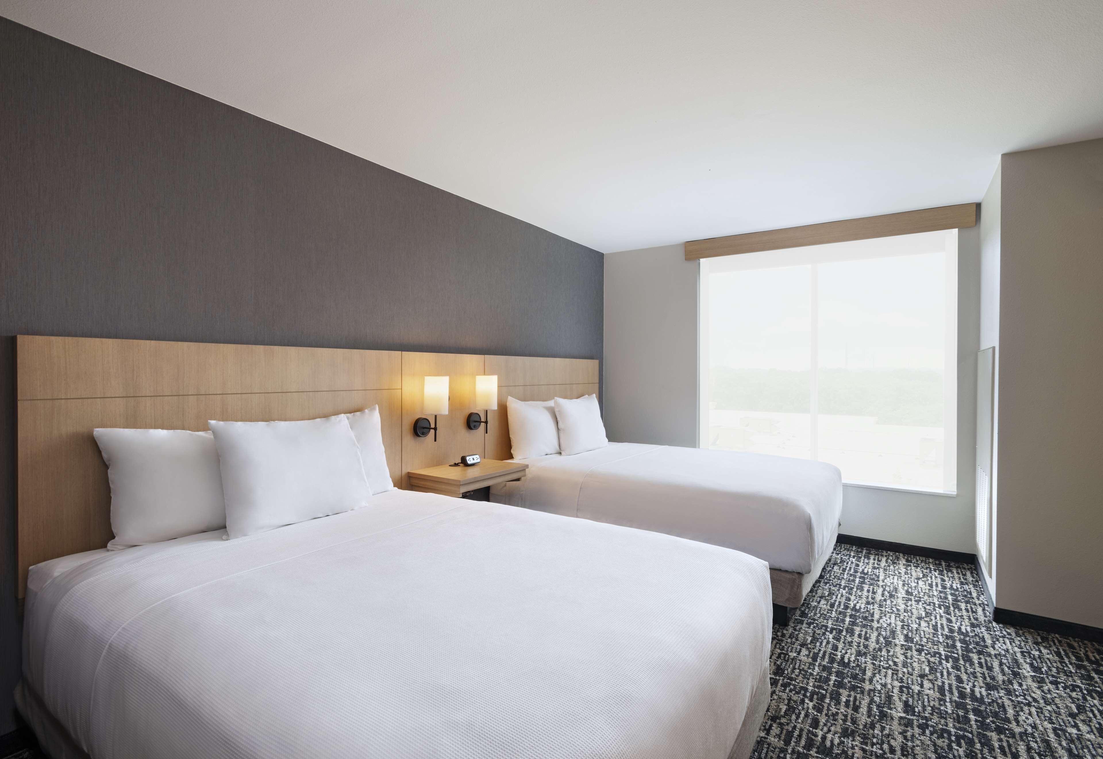 down duvets, pillow-top beds, in-room safe, desk