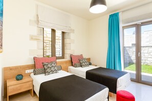 2 bedrooms, in-room safe, iron/ironing board, travel cot