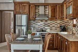 Fridge, oven, coffee/tea maker, toaster