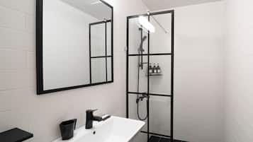 Shower, free toiletries, hair dryer, slippers