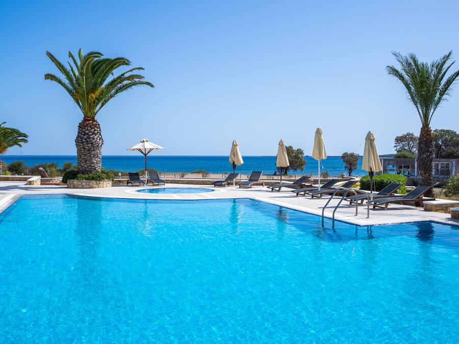 Outdoor pool, pool umbrellas, sun loungers