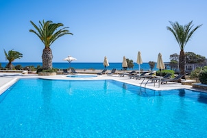 Outdoor pool, pool umbrellas, sun loungers