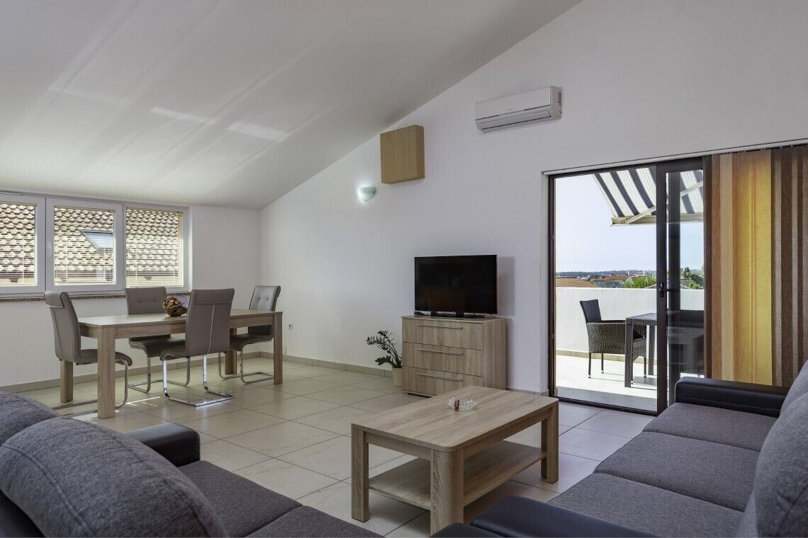 Apartment (A1) | Living area | Flat-screen TV